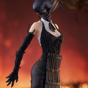 Close-up shot of the Bomb figure's upper body, focusing on the detailed teeth of the bomb head and the grenade belt.