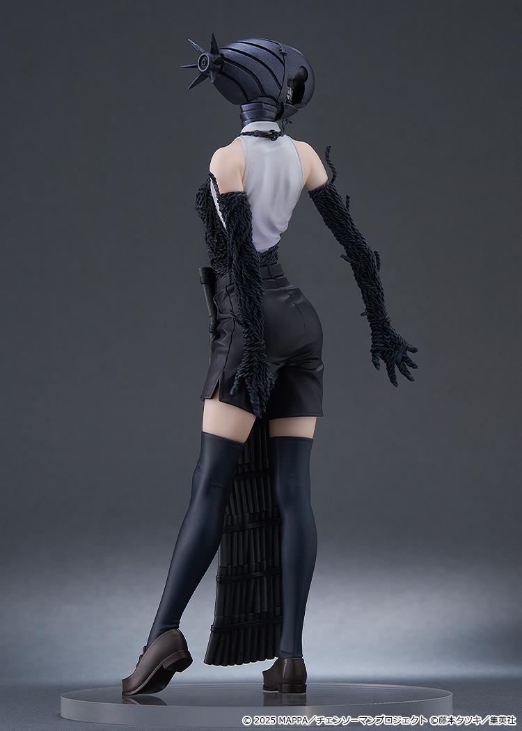 Wide-angle shot of the Bomb figure in a walking-style standing pose, emphasizing the character's long, thin limbs.