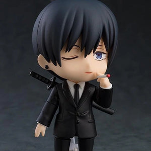 Nendoroid Aki Hayakawa figure with the one-eye-closed face plate, holding a cigarette accessory in his hand.