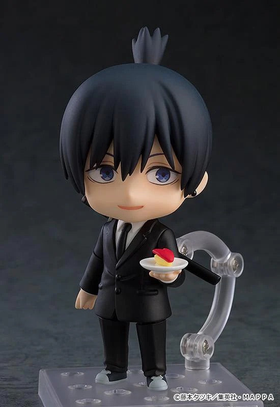 Nendoroid Aki Hayakawa figure with the smiling face plate, holding the small plate accessory with the apple bunny on it.