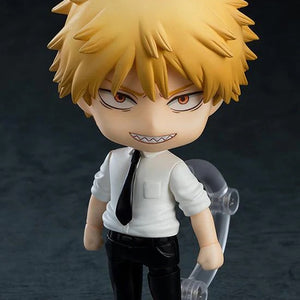 Nendoroid Denji figure in his human form with the standard face plate, showing his blonde spiked hair and toothy grin.