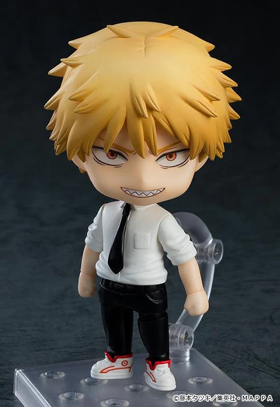 Nendoroid Denji figure in his human form with the standard face plate, showing his blonde spiked hair and toothy grin.