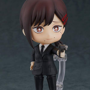 Nendoroid Kobeni figure with the nervous face plate, holding the gun accessory with both hands.