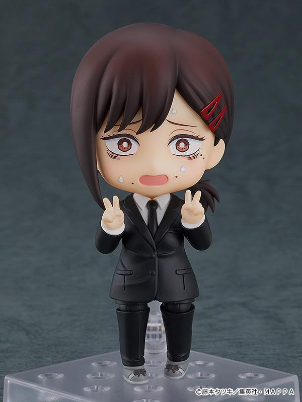 Nendoroid Kobeni figure with the nervous face plate and bent arm parts to show her shaking with anxiety.