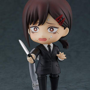 Nendoroid Kobeni figure with the nervous face plate, holding the knife accessory in a panicked combat pose.