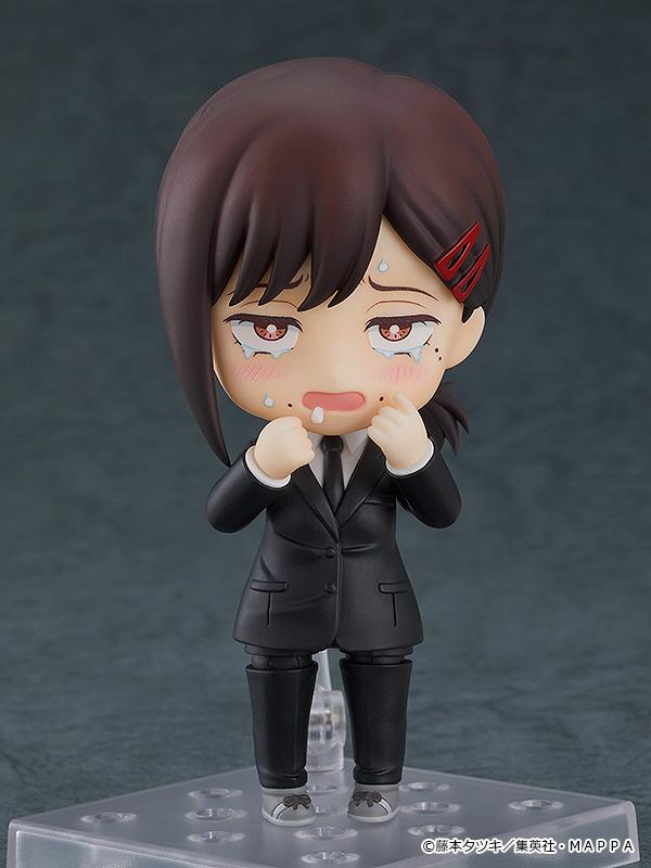Nendoroid Kobeni figure with the sobbing face plate, with her hands coming up to her face.
