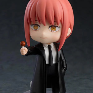 Nendoroid Makima figure wearing the trench coat optional part, holding the lollipop accessory with a smiling face plate.