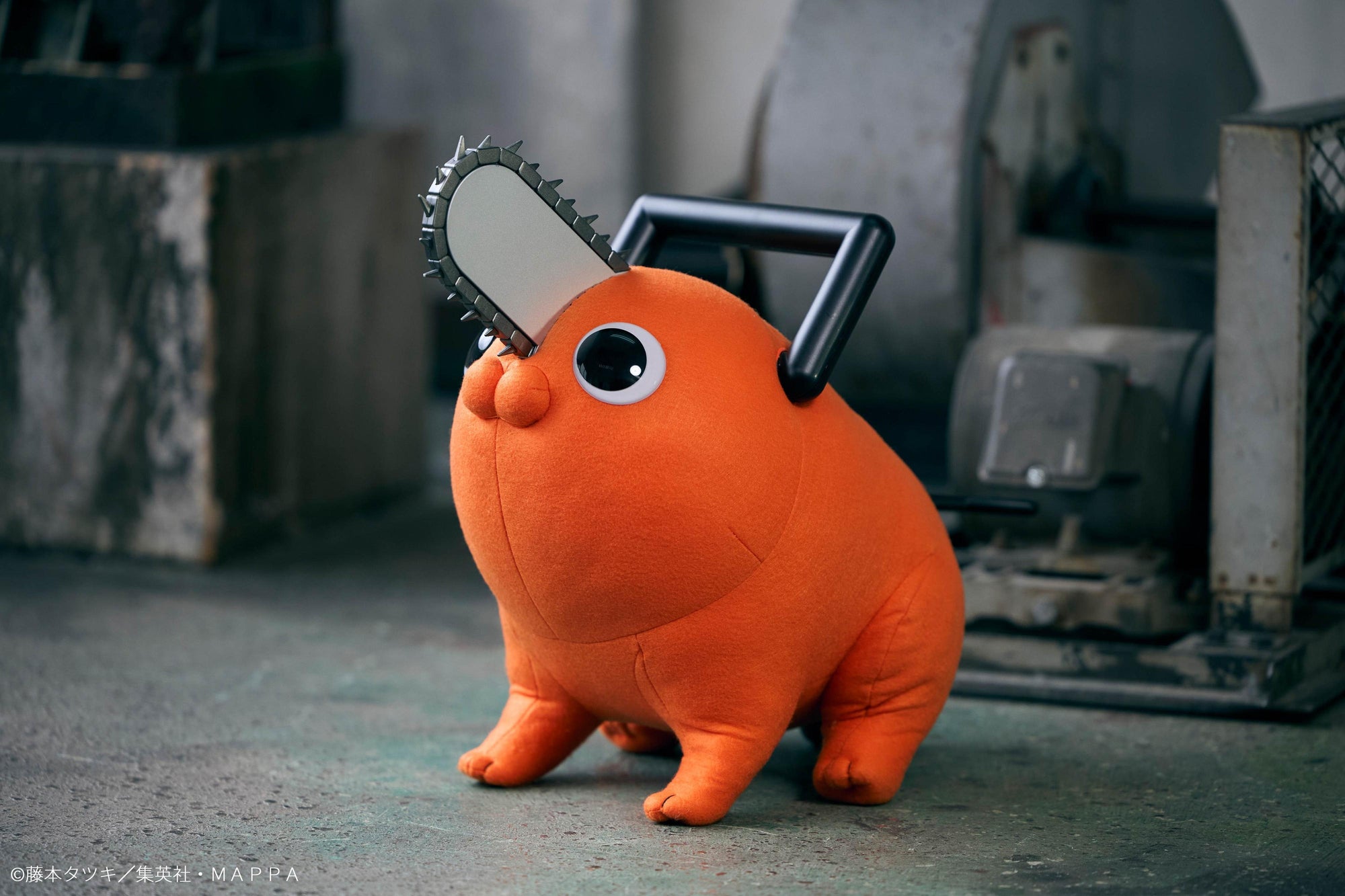 Three-quarter view of the Chainsaw Man Pochita Life Size Doll standing in an industrial studio setup.
