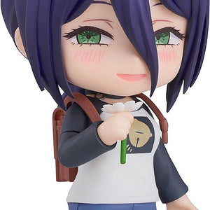 Close-up front view of the Reze casual outfit Nendoroid figure from Chainsaw Man holding a white flower against a plain white background.