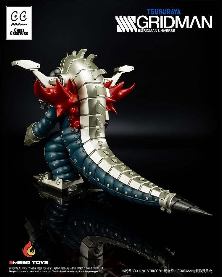 An angled rear shot focusing on the silver plated tail and the high-gloss paintwork of the Revenge Kaiju.