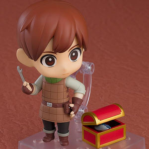 Chilchuck Nendoroid holding his picking tool next to a red and gold treasure chest accessory.