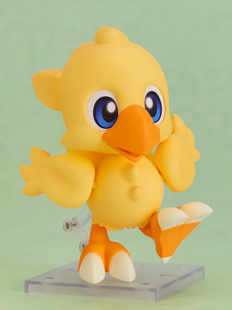 Chocobo Nendoroid posed as if running or jumping, supported by the included articulated display stand.