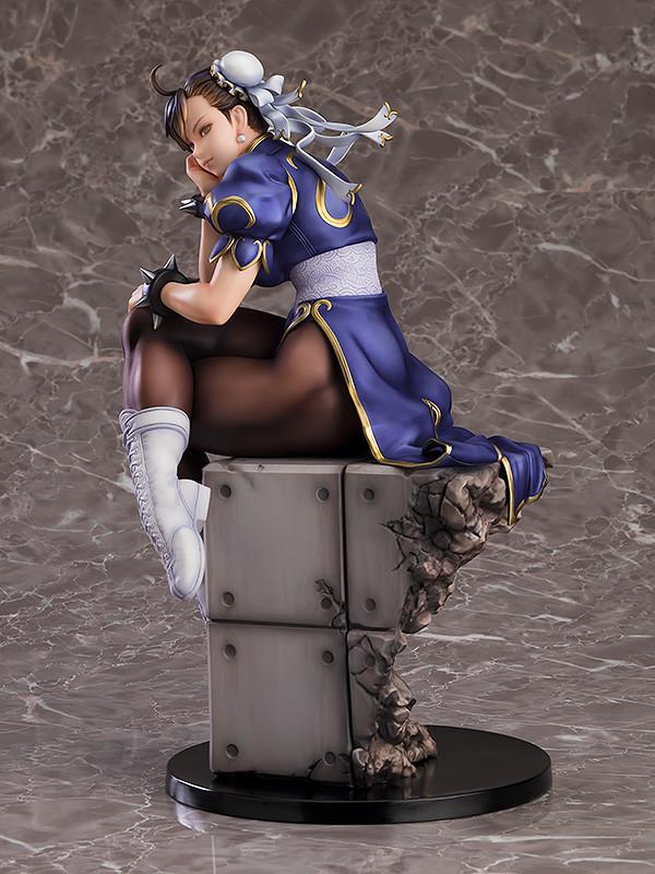 Side view of the 1/6 scale Chun-Li figure highlighting the muscular physique and fabric textures.
