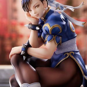 High-detail close-up of the Chun-Li 1/6 scale figure's face, based on Akiman's pharmacy booklet art.