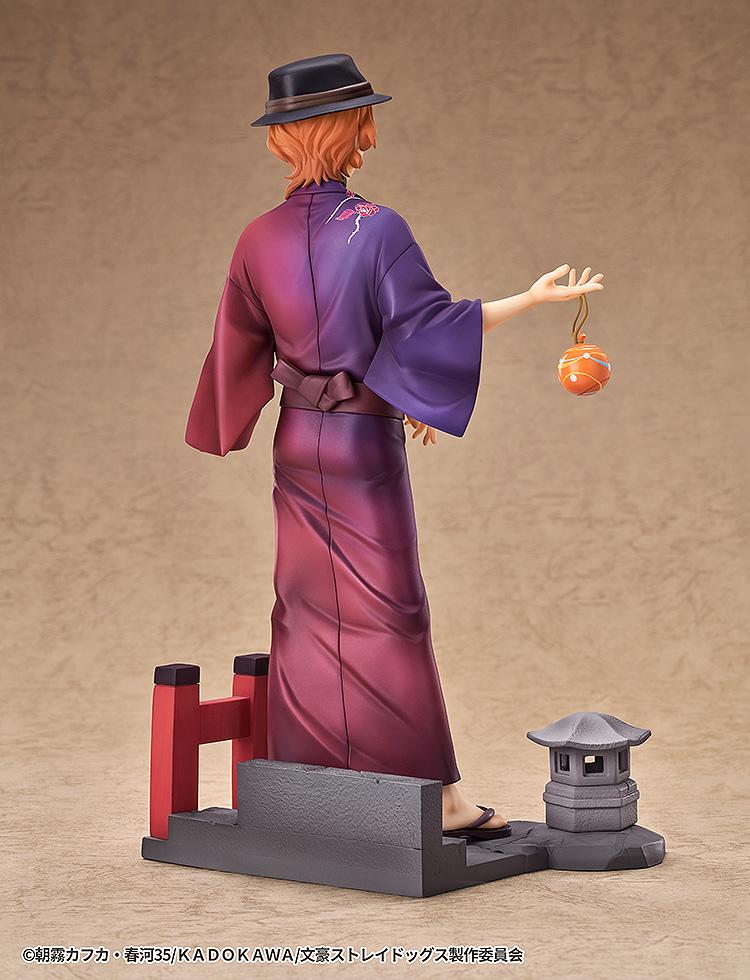 Back view of the figure showcasing the diorama base with cobblestones, a stone lantern, and a red torii gate.