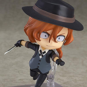 Action pose of Chuya Nakahara Nendoroid featuring a belligerent combat expression and holding a knife accessory.