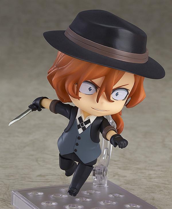 Action pose of Chuya Nakahara Nendoroid featuring a belligerent combat expression and holding a knife accessory.