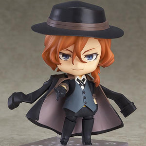 Chuya Nakahara Nendoroid figure standing on a clear display base with his signature black coat draped over his shoulders.