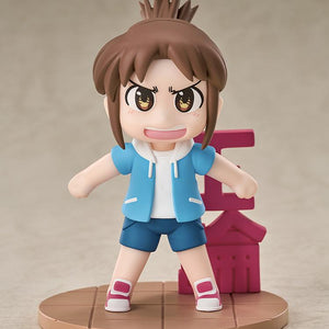 Studio front view of the non-articulated Midori Nagumo Mini Memory collectible figure wearing a blue hoodie and dark shorts on a round base.