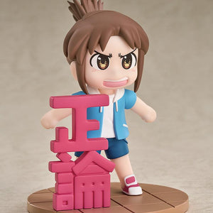 Side angle view highlighting the large 3D pink Japanese kanji character piece standing alongside the Midori Nagumo 3.34-inch plastic chibi figure.