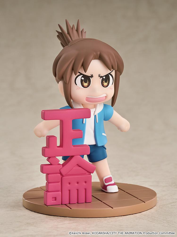 Side angle view highlighting the large 3D pink Japanese kanji character piece standing alongside the Midori Nagumo 3.34-inch plastic chibi figure.