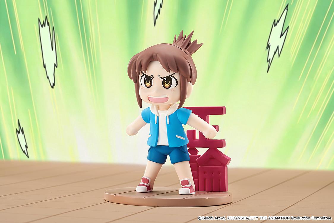 Promotional action display of the CITY THE ANIMATION Mini Memory Midori Nagumo figure posed in front of vibrant green anime speed lines.