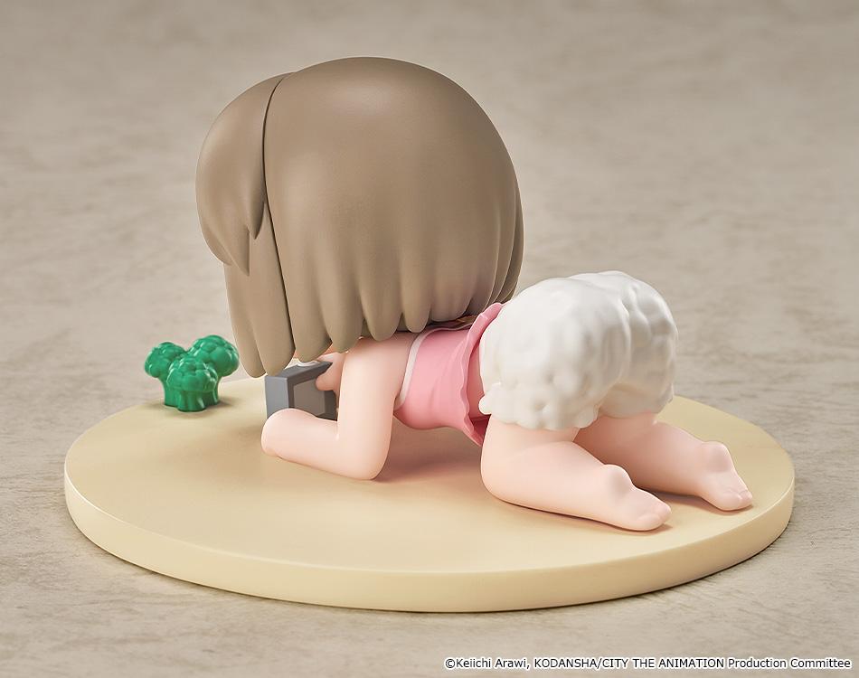 Rear three-quarter angle view of the CITY THE ANIMATION Niikura 2-inch plastic chibi figure showing ruffled diaper bloomers and crawling pose.