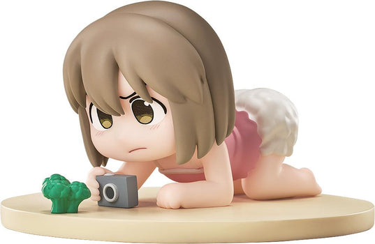 CITY THE ANIMATION Mini Memory Niikura chibi figure crawling on a circular base holding a toy camera in front of a broccoli floret against a white background.