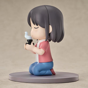 Side profile view of the CITY THE ANIMATION Wako Izumi 2.76-inch plastic chibi figure holding a small aromatic bottle.
