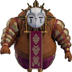 Front view of the large, round Clair Obscur: Expedition 33 Esquie Nendoroid figure on a white background, featuring a white theatrical mask, a gold sunburst halo, and a maroon banner with gold symbols hanging down the front.