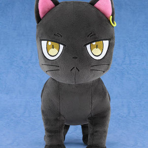 Full standing front view of the Claude black cat anime plushie on a textured blue studio background