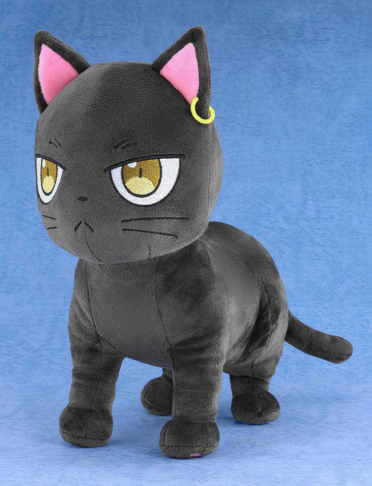 Three-quarter side angle view of Good Smile Company's Claude black cat plushie displaying its standing pose and tail