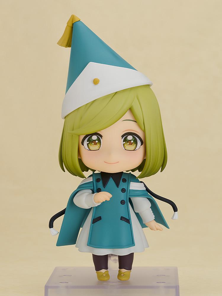Full body front shot of the Coco Nendoroid action figure utilizing her pre-painted gently smiling face plate, displayed securely on a clear square plastic stand.