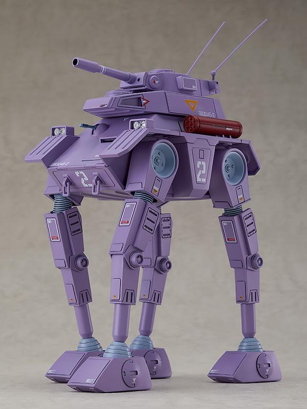 Studio shot of the assembled Crab Gunner plastic model kit showing the main turret cannon and articulated legs.