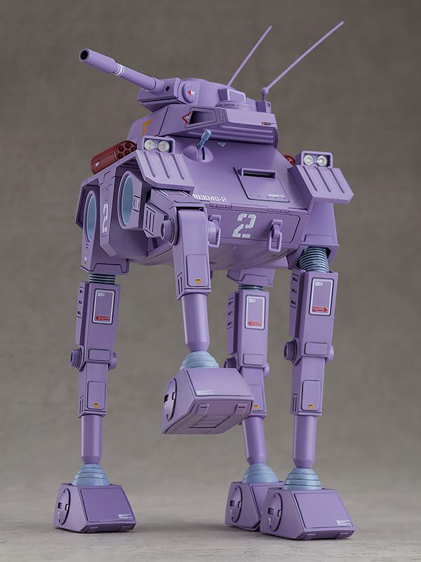 Action pose of the Crab Gunner model kit with one leg lifted to demonstrate its range of articulation.