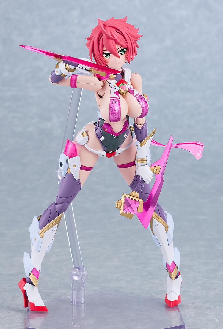 Wide-stance defensive pose of the Cutie Honey Nova plastic model kit holding a small translucent pink knife accessory close to her chest.
