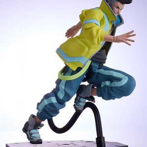 Dynamic side view of the David BUZZmod figure in a mid-air sprinting pose supported by a black articulated display stand.