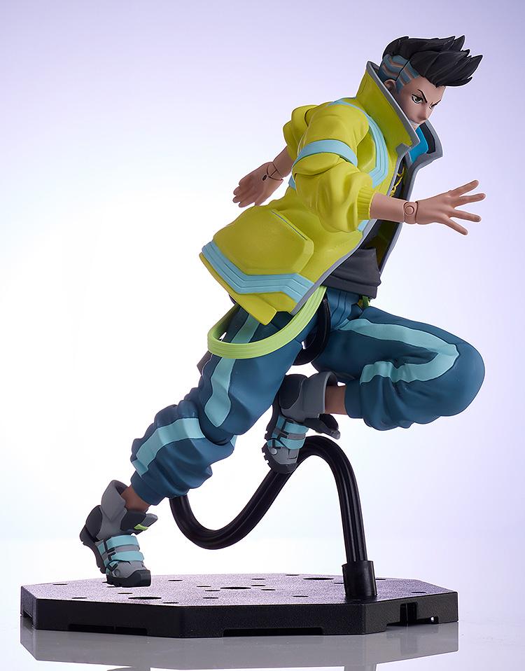 Dynamic side view of the David BUZZmod figure in a mid-air sprinting pose supported by a black articulated display stand.