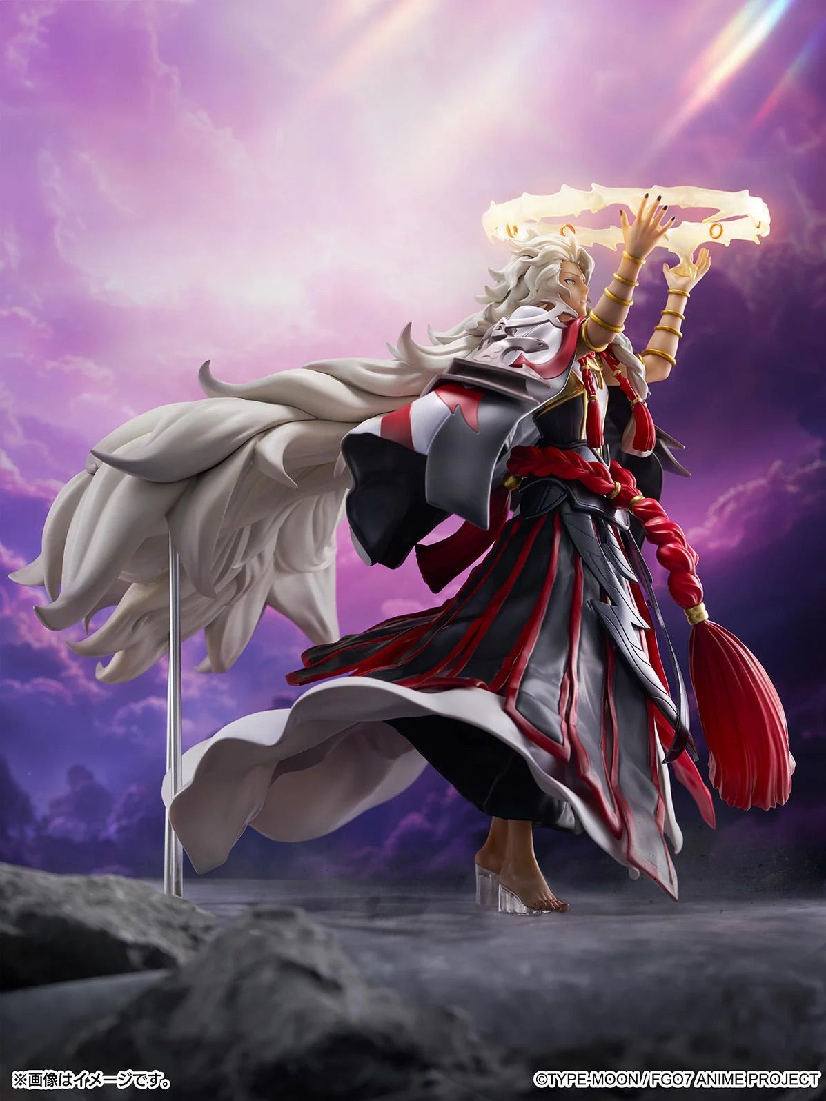 Side profile of the Solomon figure in a dynamic action shot, showing the intricate sculpt and flow of his large white and red cloak.