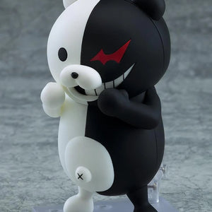 Close-up of the Nendoroid Monokuma figure, emphasizing the smile on the white side and the evil grin on the black side.