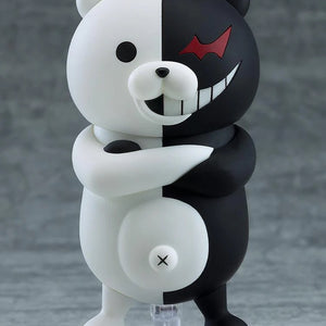 Nendoroid Monokuma figure with the smiling face plate, posed with his arms crossed, showing the classic black and white color split.