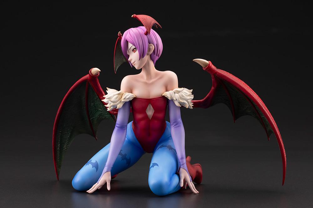 Left front angle of the Darkstalkers Lilith 1/7 Scale Figure featuring expressive facial sculpt, wings, and dynamic kneeling pose.