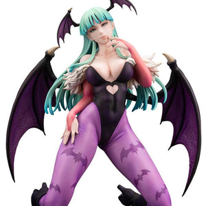 Isolated white studio cutout of the Darkstalkers Morrigan Aensland 1/7 scale figure kneeling in her succubus outfit with wings spread.