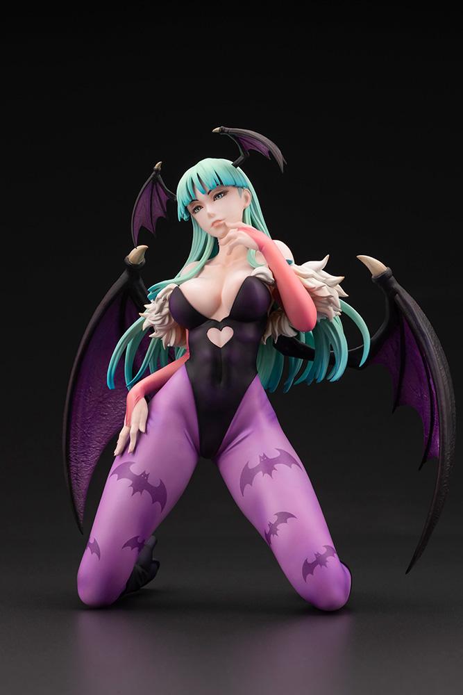 Three-quarter studio view of the Morrigan Aensland 1/7 scale figure highlighting her bat-patterned leggings and black leotard.