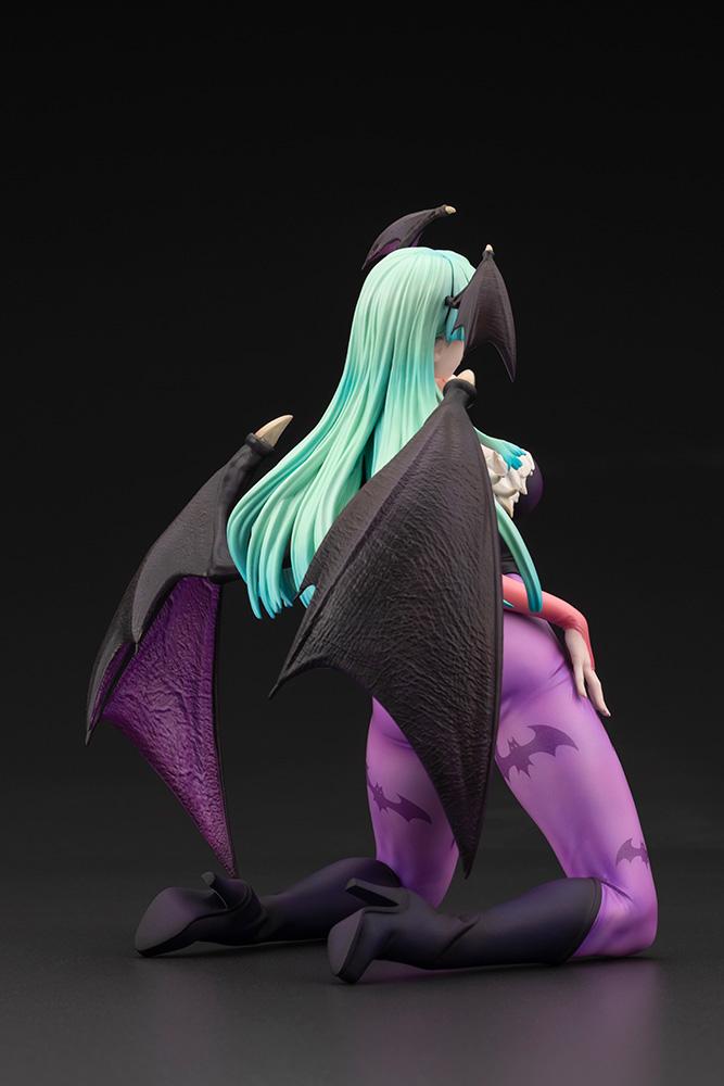 Angled back view emphasizing the realistic wing membrane texture and hair sculpt on the Darkstalkers Morrigan figure.