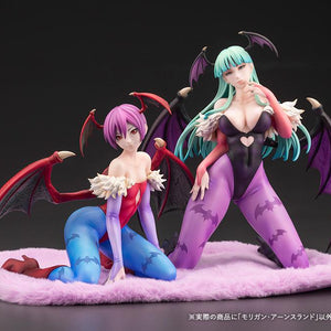 Display setup featuring the 1/7 scale Morrigan Aensland figure displayed next to the Lilith figure on the included pink plush cloth base.