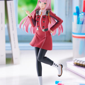 Vertical lifestyle shot of the Darling in the Franxx Zero Two Pop Up Parade L figure standing in natural daylight on a desktop.