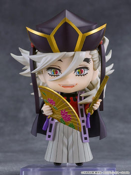 Demon Slayer: Kimetsu no Yaiba Doma Nendoroid figure standing on display base holding gold lotus fans with smiling faceplate.
