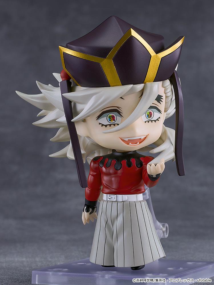 Doma Nendoroid figure shown without cloak wearing red turtleneck top and grinning faceplate.