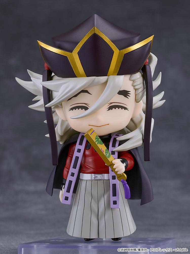 Demon Slayer Doma Nendoroid figure featuring closed-eye mesmerized faceplate and holding a closed fan.